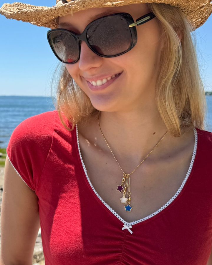 LINK customer wearing her necklace