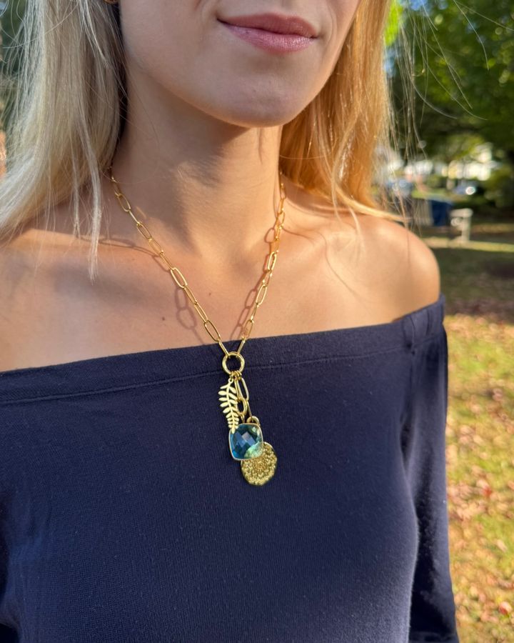 LINK customer wearing her necklace