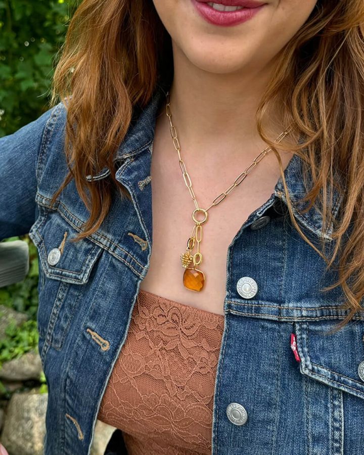 LINK customer wearing her necklace